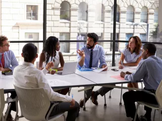 Small workgroup in meeting room 